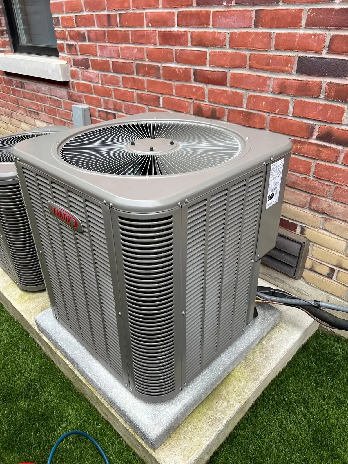 Lennox AC condenser installed at the side of a GTA home