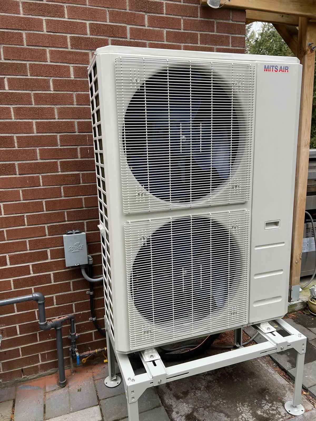 Large cold-climate twin-fan heat pump installed by Delson Air on a GTA home