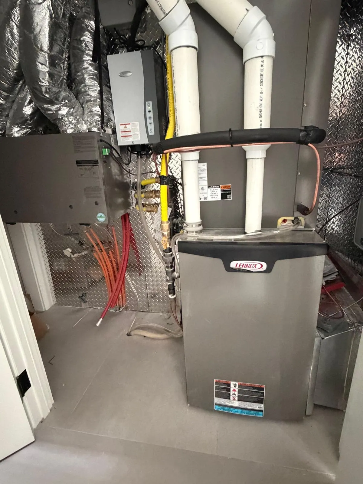 Spotless mechanical room with a Lennox high-efficiency furnace